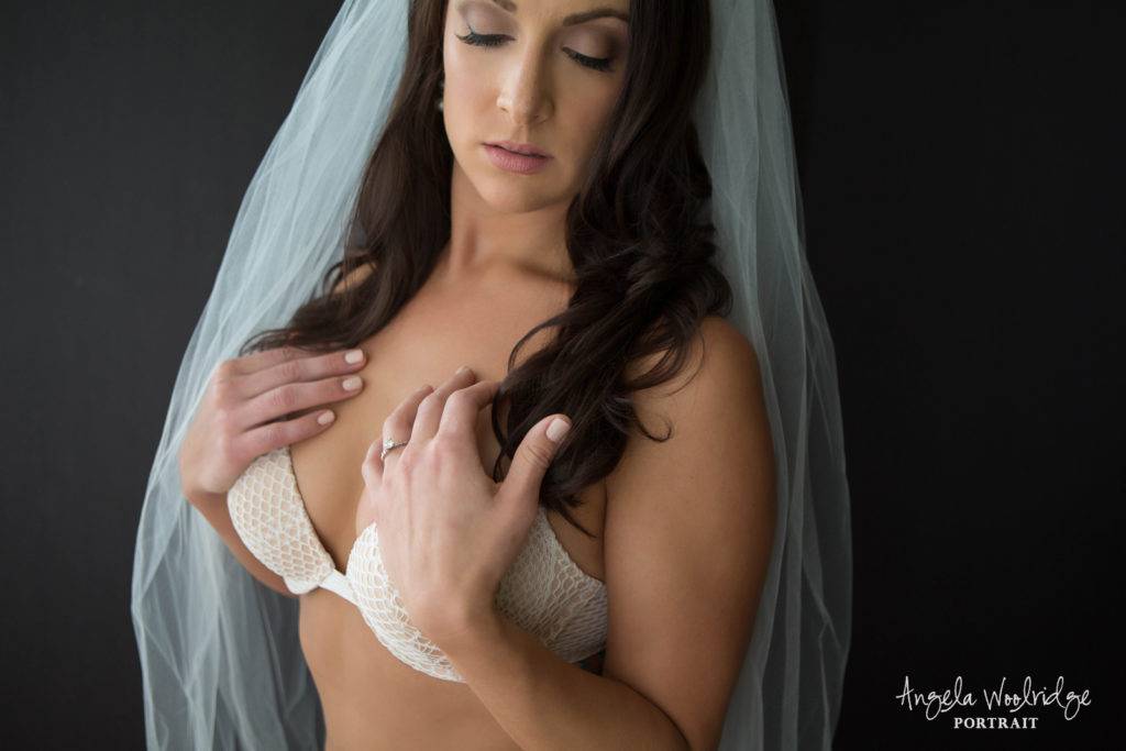 stunning bridal boudoir photography, woman in her lingerie and veil
