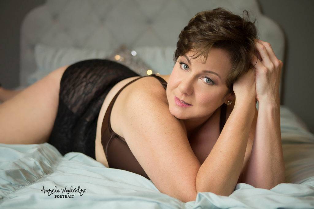 Alluring woman in boudoir pose
