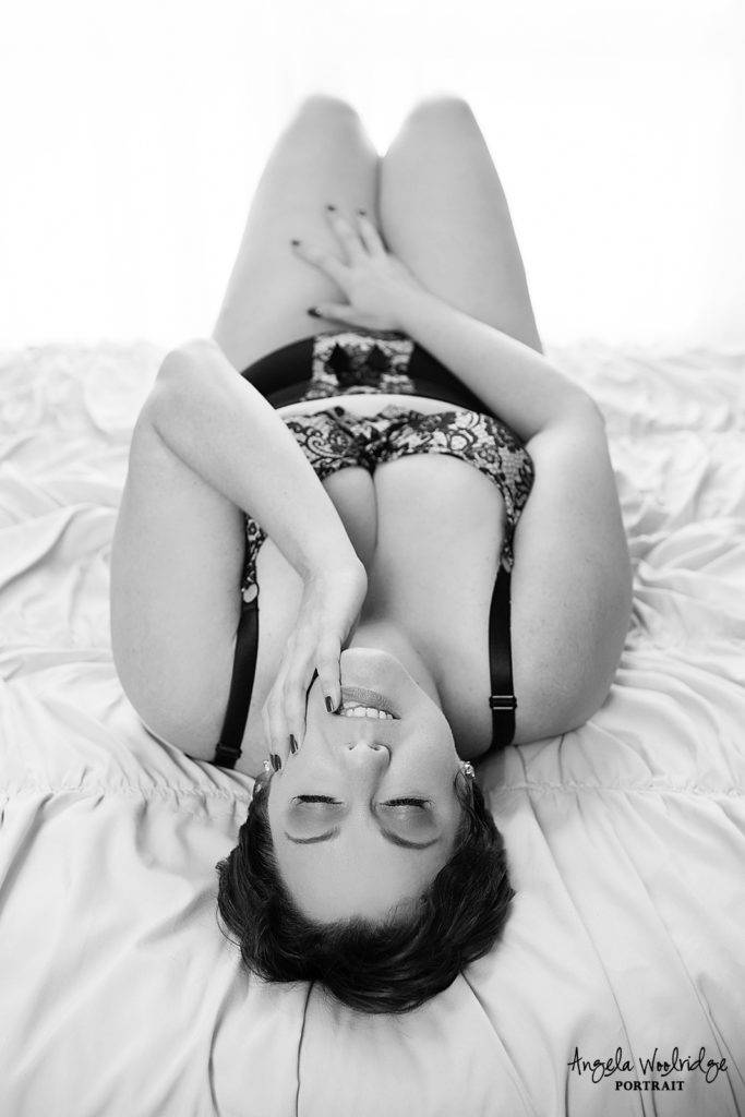 Sexy, confident woman in boudoir picture
