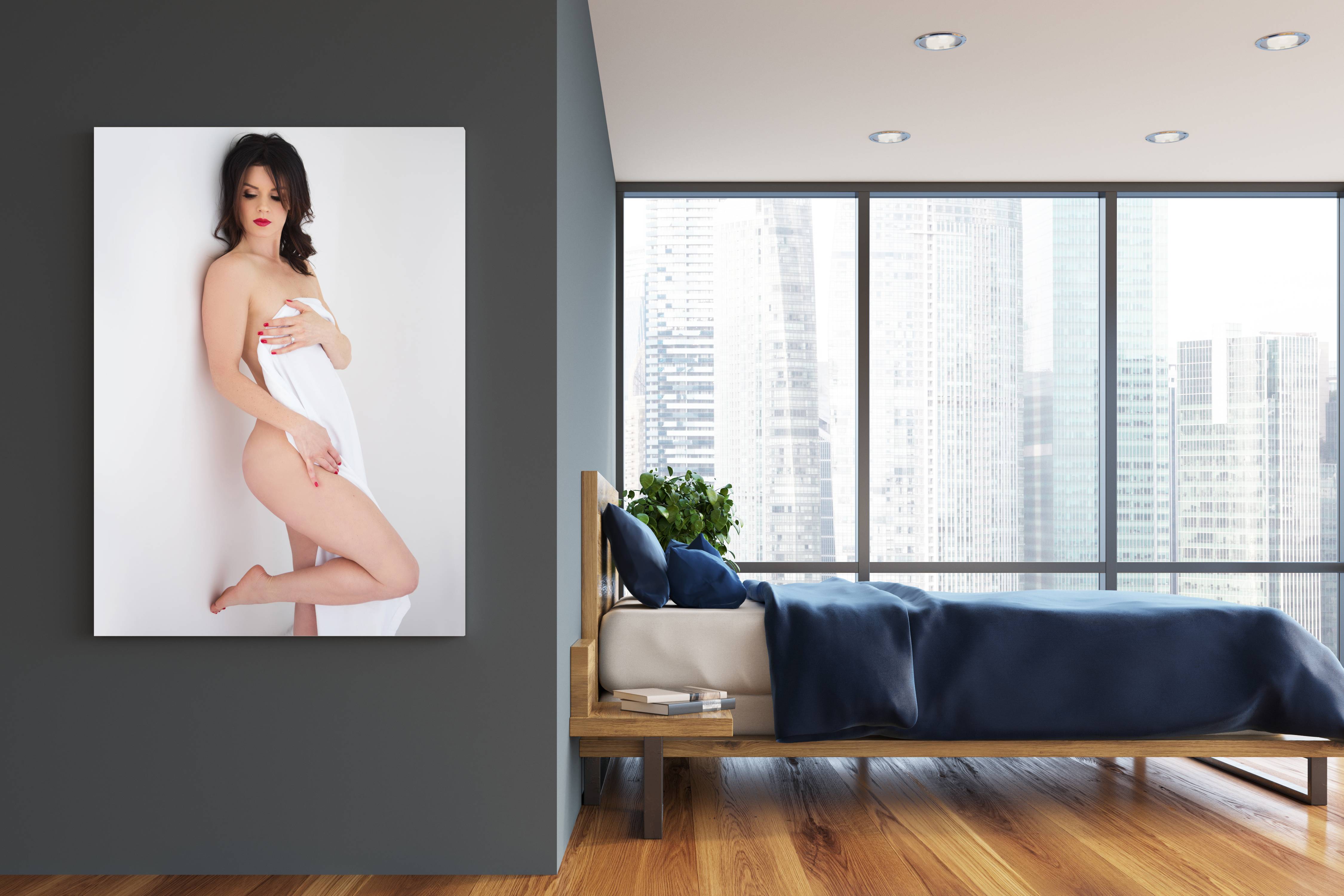 Boudoir photo as wall art in master bedroom